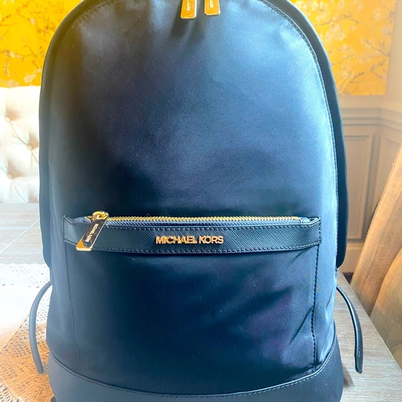 Micheal Kors Black Nylon and Leather Backpack.